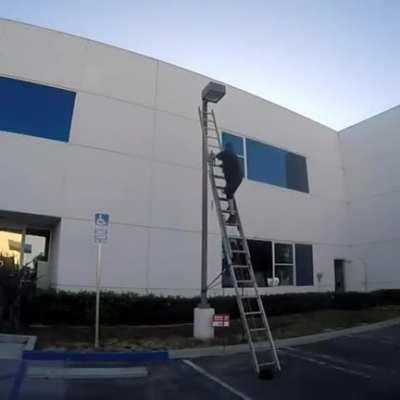 WCGW Fixing a broken street post.