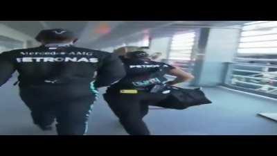 Lewis Hamilton on his way to stewards to complain after he gets DSQ from qualifying