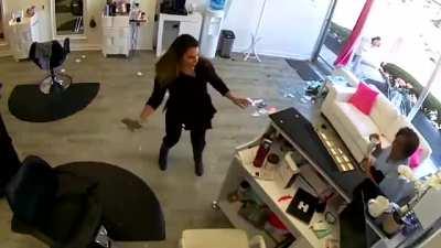 Deer crashes into a hair salon