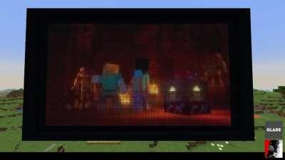 A friend and I made a project that allows you to play movies in-game!