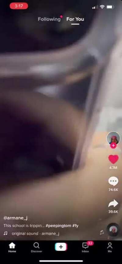 A one way mirror is in the girls locker room in a school