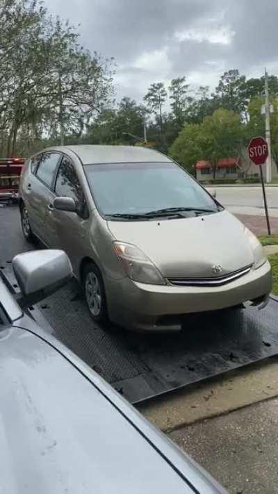 My friend had her car towed. She was filming because the tow truck driver was peacocking about his technique to unload cars.