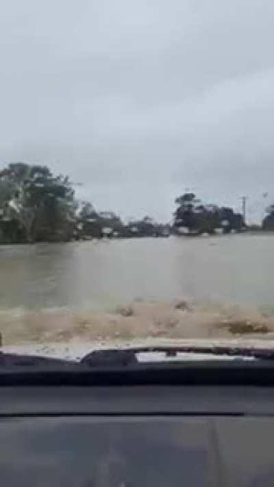 WCGW... driving through a flooded road in Australia