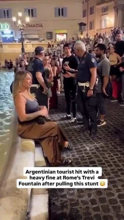 Entitled Tourist Fined by Italian Police for Disrespecting Rome's Historic Trevi Fountain