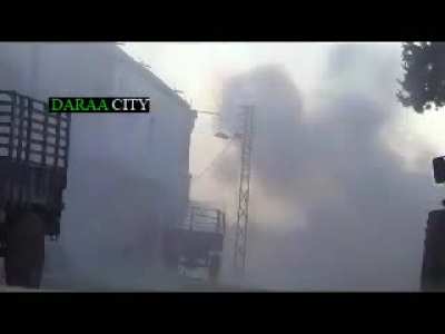 Failed FSA IED attack on a speeding Syrian Army tank - Daraa - 1/21/2013