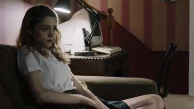 Natalia Dyer putting on a show