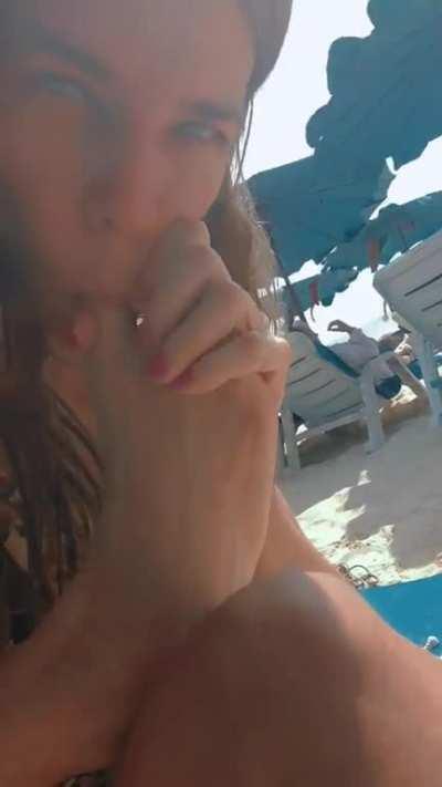 Public beach self worship 