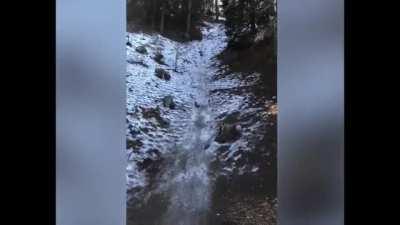 Using a boogie board to sled down steep hill.......