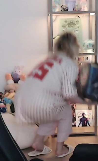 Hyoon putting things on her shelf - September 2025