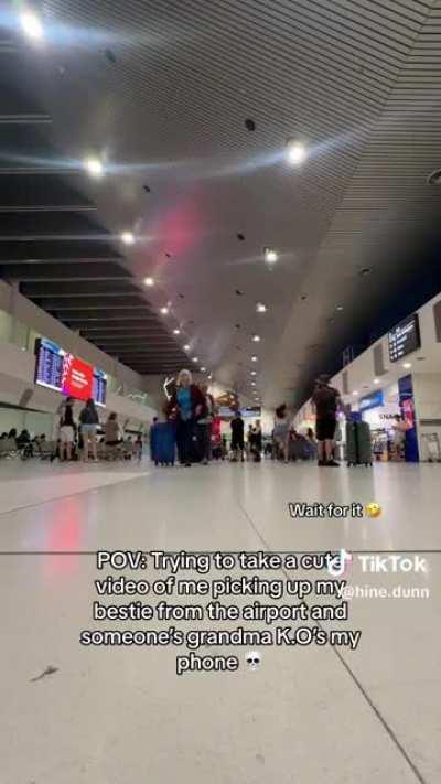 The woman left her phone to record herself picking up her friend and it happened