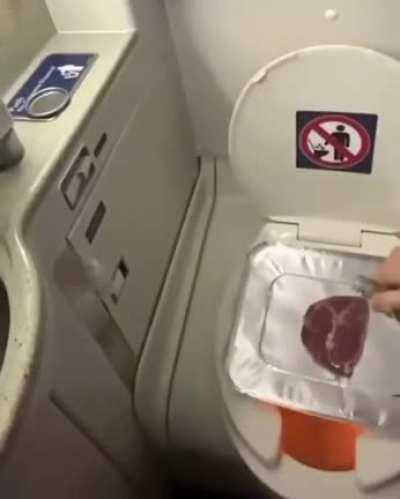 Mans eating good for economy seating