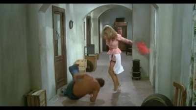 Ursula Andress Knees a Man in the Balls in Colpo in Canna/Loaded Guns (1975)