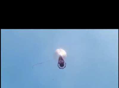 Lighting fireworks attached to a hot air balloon