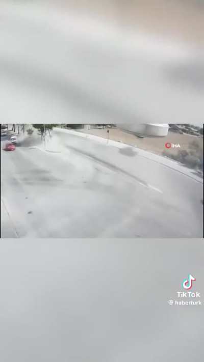 Car driving wreckless speeds hits another vehicle stopped at a light