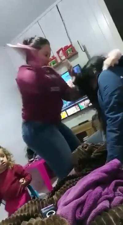 Mother smacks her daughter around for refusing to unlock her phone.