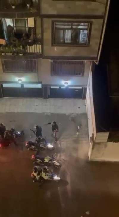 Iranian protesters are running away from police and suddenly some random person opens the doors for them