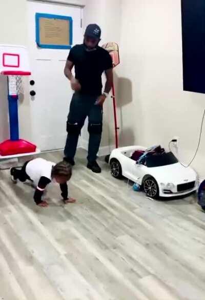 Went from blocking his kid to his kid blocking his other kids.