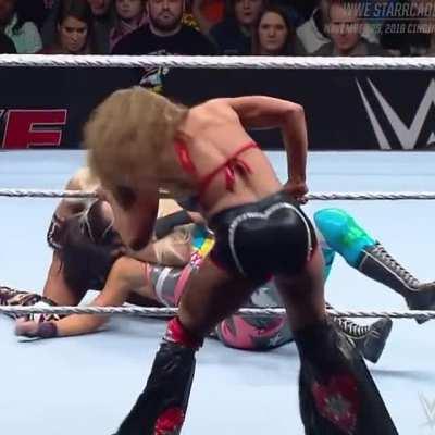Mickie bent over