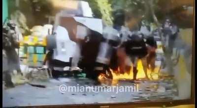 PTI workers throw Molotov Cocktail at police at Zaman Park Lahore.