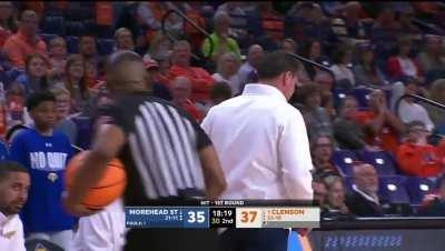 The Morehead State basketball coach and referee Ted Valentine...spank eachother?