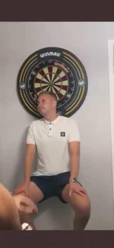 Gets a dart right in the eye.