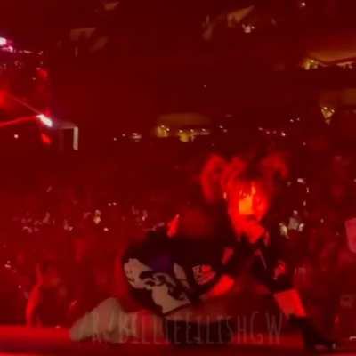 Billie Eilish on her knees