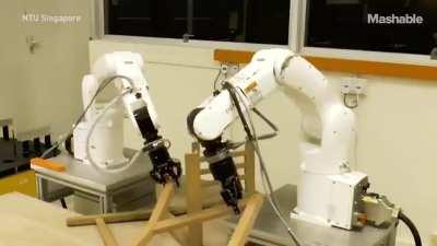 This robot is training to become a construction worker