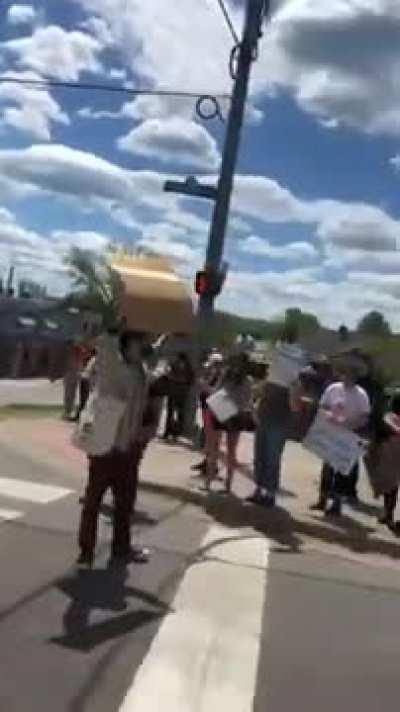 Pickup Truck driver Rolls the Coals on protestors