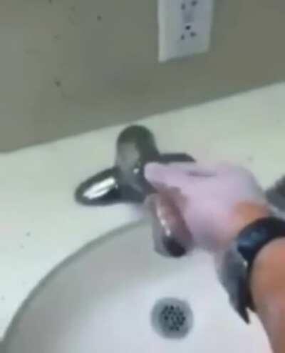 This guy washing his hands ...