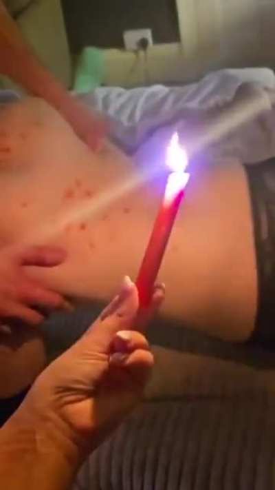 Wax play while hubby fucks her