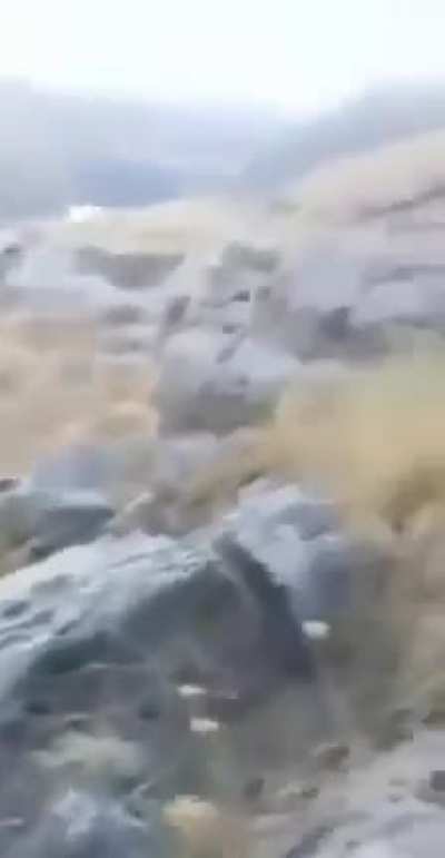 Turkish commando making sure the PKK terrorist is dead