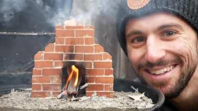 Tiny working fireplace that I made (face for scale)