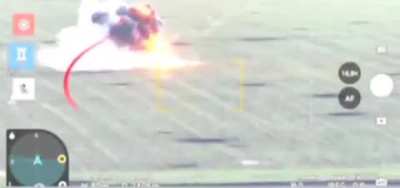 A Ukrainian drone watches as a russian infantry biker drives across a field and hit a mine.