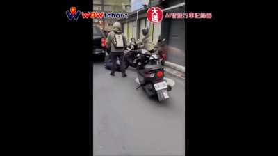 Pit bull opens car window and attacks scooter rider