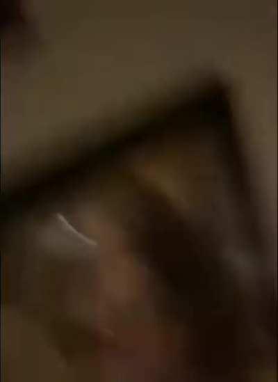 Extinguishing the oily fire with water.