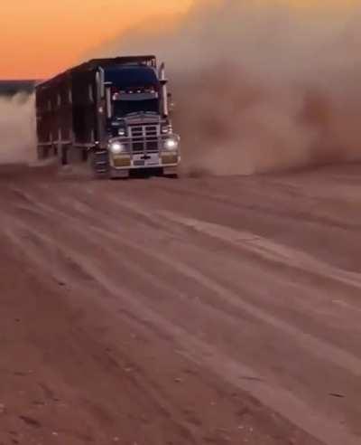 A road train on the Plenty Highway in the Northern Territory Outback.