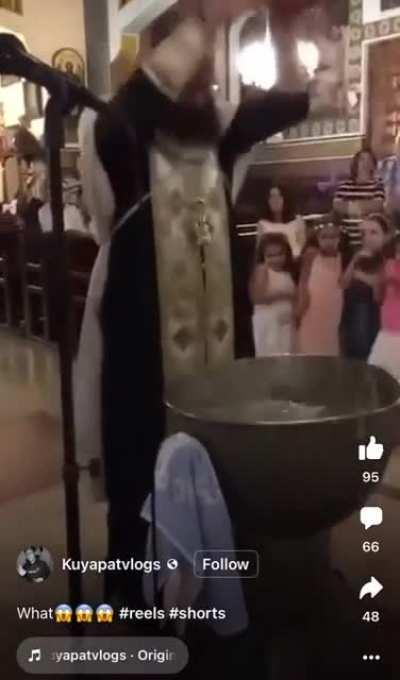 Would you trust this guy with yo kids? The way he's holding that baby...