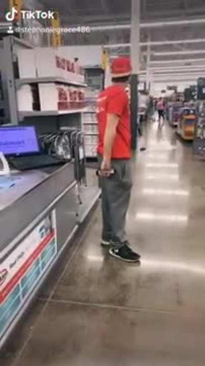 A guy farting in a store.