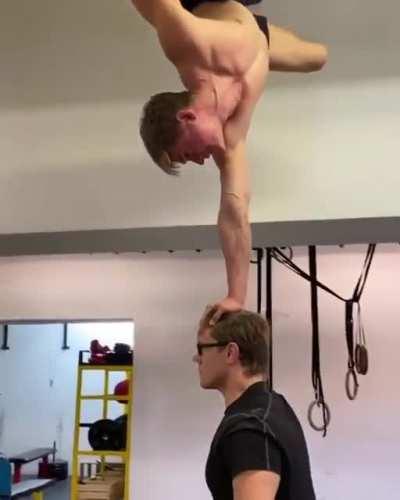 Handstand Head Squat.