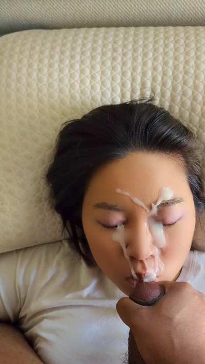 Thick cumshot to the eyes for a nice facial