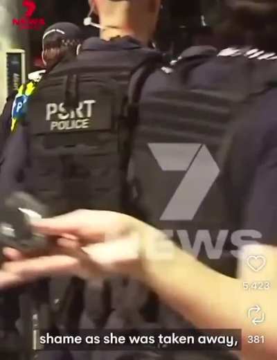 An 18-year-old woman in Queensland faces two years in jail for wearing a shirt that says 