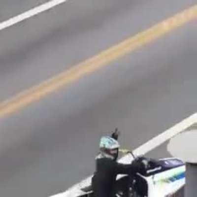 Guy driving jet ski on the street