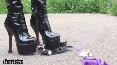 Eva in Shiny Black Platform Boots VS Toy Car