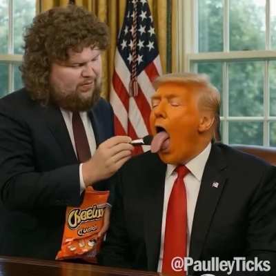 JD Vance putting on Donald Trump's makeup