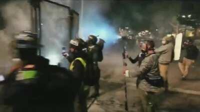 Federal agents use leaf blowers to cover rioters in tear gas - Portland day/night 58