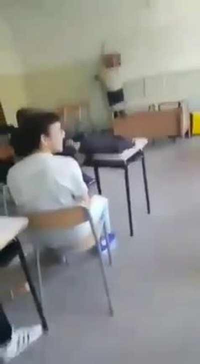 POS Throws trash can at professor