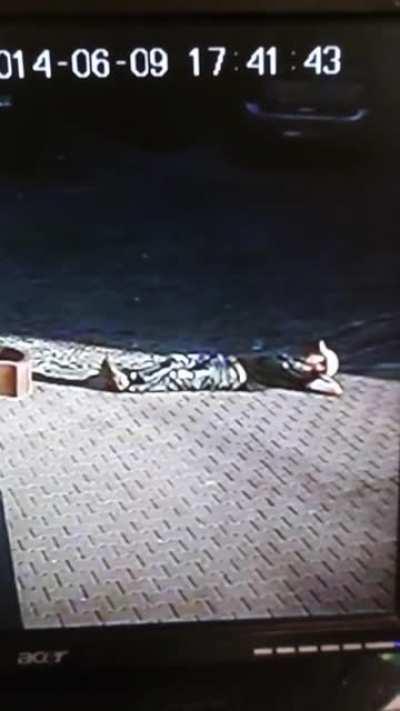 Laying on the sidewalk (WARNING: INJURY)