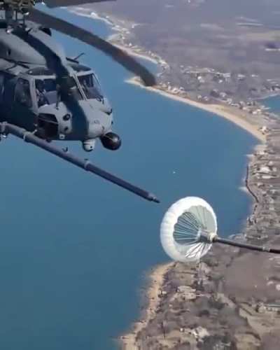 How a helicopter is refueled mid air!!