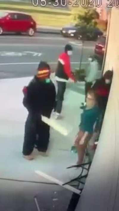 Peaceful™ protestors beating an old lady who was camly telling them not to vandalize her business