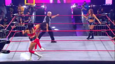 Cassie Lee struggles against Madison Rayne